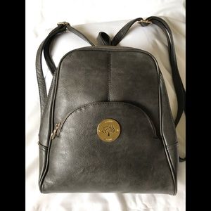 New! Grey  backpack, lots of compartments, beautiful style.